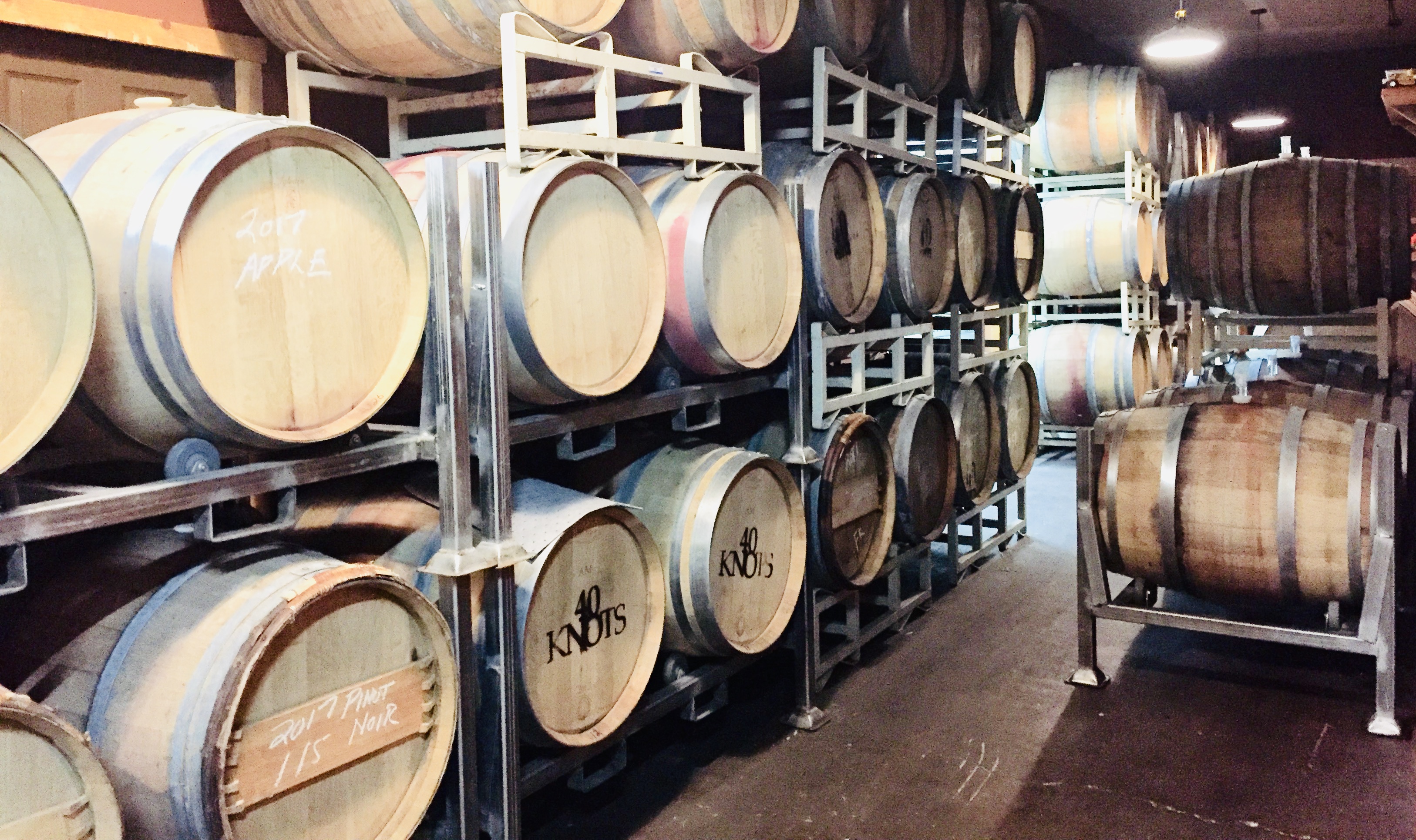image of wooden wine casks in wine cellar