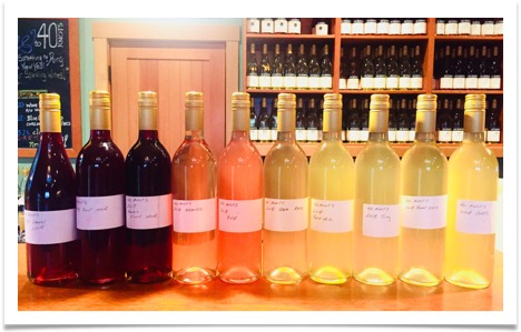 Image of wine bottles with dated lables.