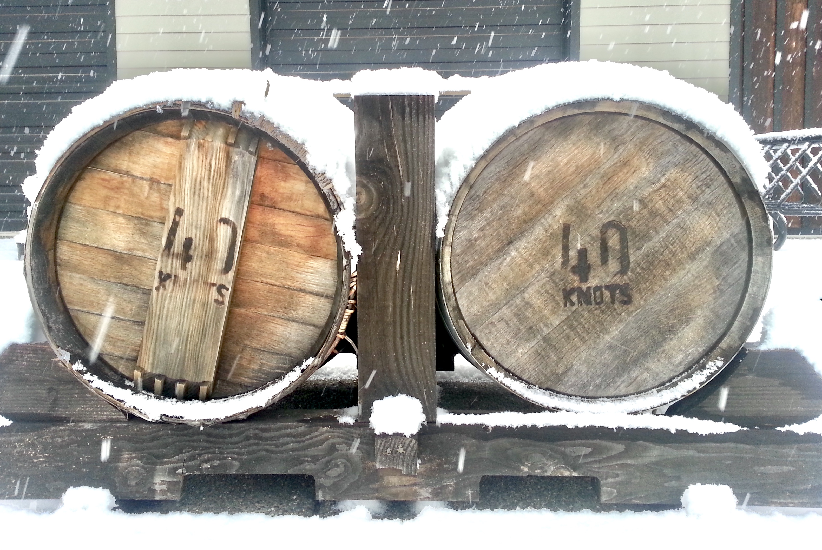 image of two wine casks covered in snow