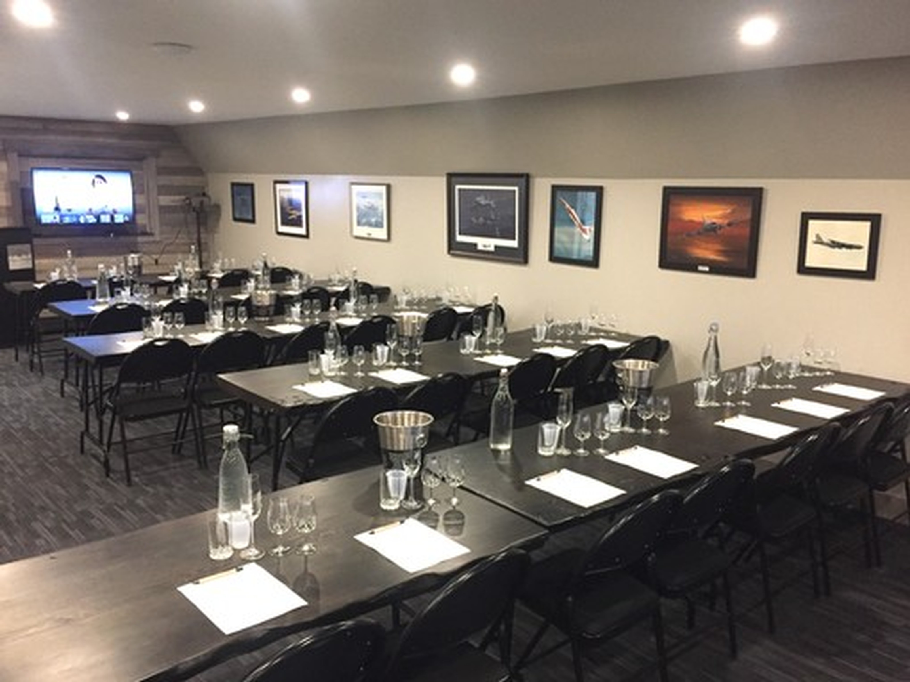 image of tables in a row setup for 40 Knots wine classes.