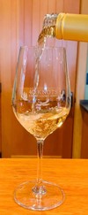 image of 40 knots L Orange bottle pouring into wine glass