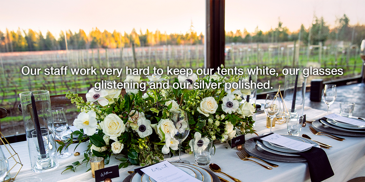 Image of stylish table set with beautiful flowers.